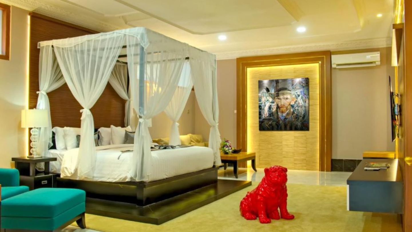Un tipo di camera da letto a Raintree Boutique