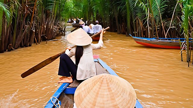 Barca a remi sul Mekong